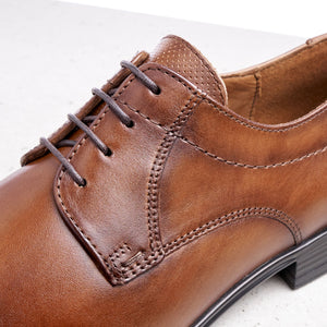 Lloyd Osmond | Leather Dress Shoe with Punched Tongue Detail in Cognac Brown